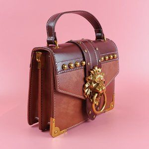prada lion head bag
